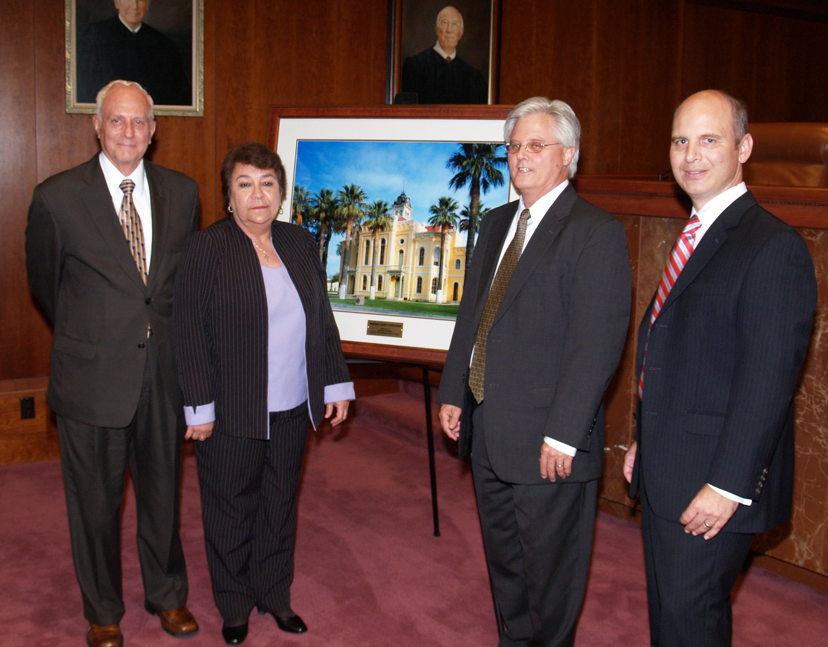 Former Clerk John Adams, Deputy Clerk Blanca Valdez, former Clerk Andrew Weber, Clerk Blake Hawthorne in 2010. Photo: Osler McCarthy, Texas Supreme Court.